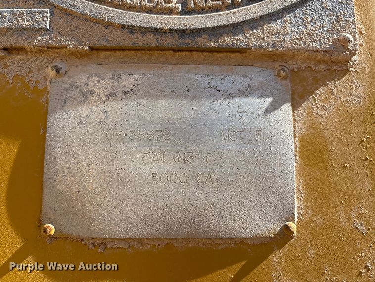 image for item ES7004 2007 Caterpillar 613C water wagon