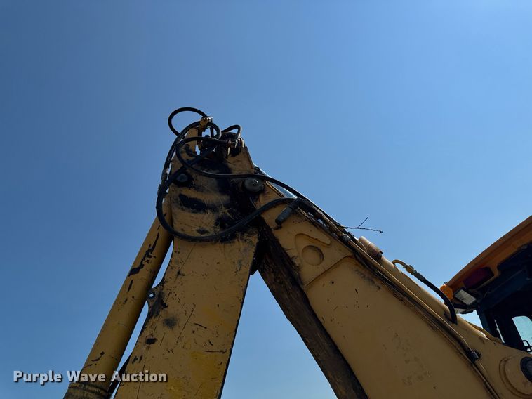 image for item ED1473 2001 John Deere 310G backhoe