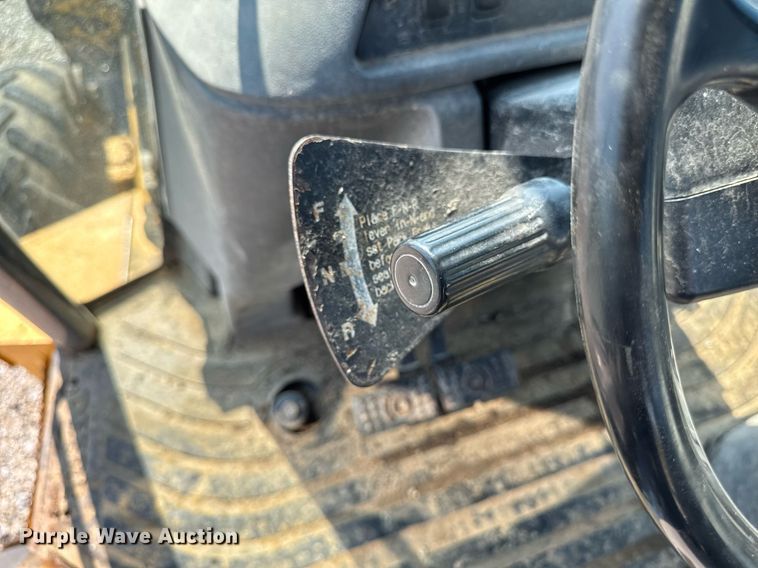 image for item ED1473 2001 John Deere 310G backhoe