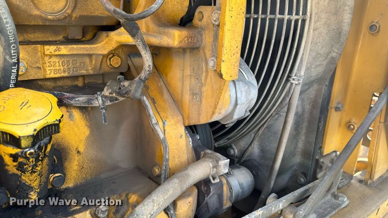 image for item ED1473 2001 John Deere 310G backhoe