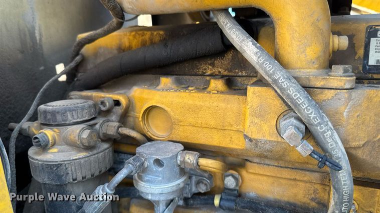 image for item ED1473 2001 John Deere 310G backhoe