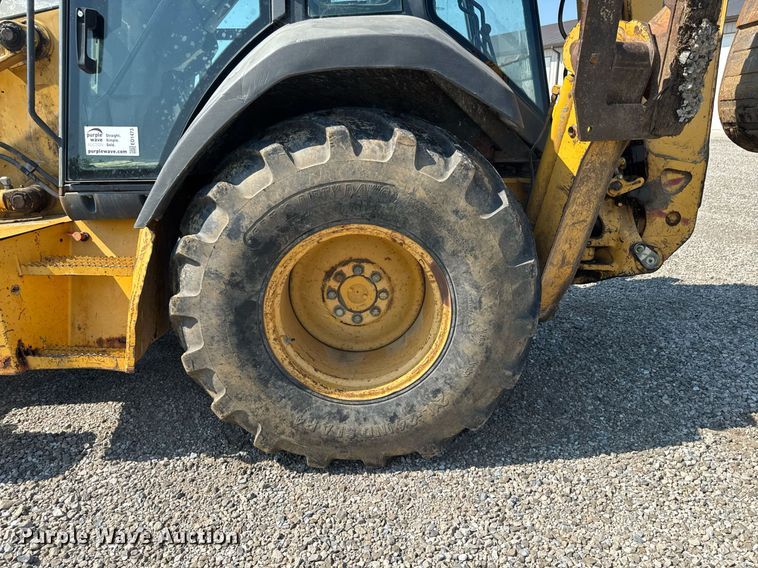 image for item ED1473 2001 John Deere 310G backhoe