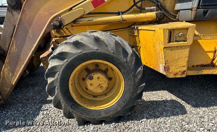 image for item ED1473 2001 John Deere 310G backhoe