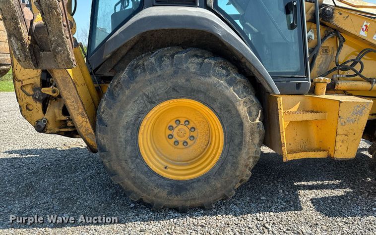 image for item ED1473 2001 John Deere 310G backhoe