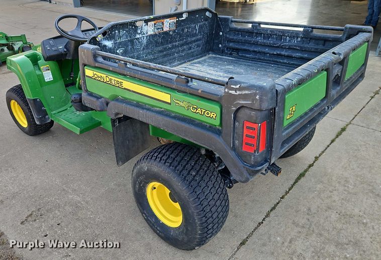 image for item EO4614 2014 John Deere Gator TX utility vehicle