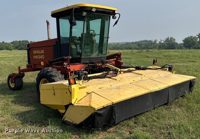 image for item ER2118 1999 New Holland HW340 swather / windrower