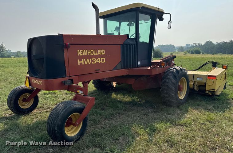 image for item ER2118 1999 New Holland HW340 swather / windrower