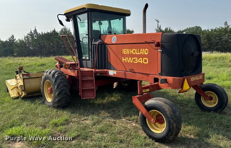 image for item ER2118 1999 New Holland HW340 swather / windrower