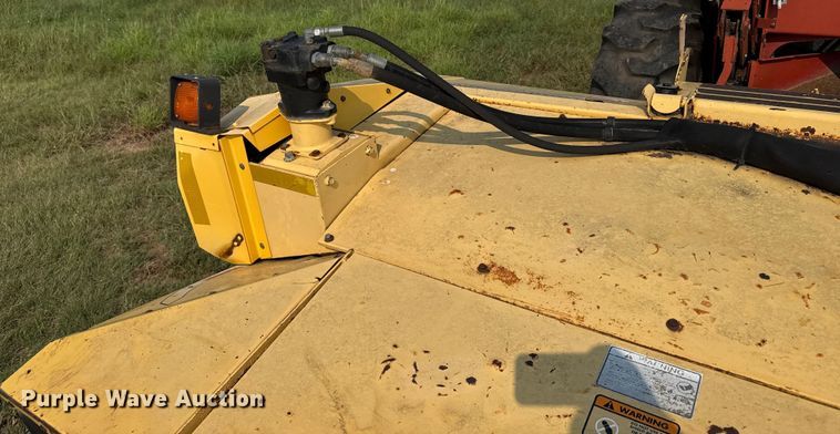 image for item ER2118 1999 New Holland HW340 swather / windrower