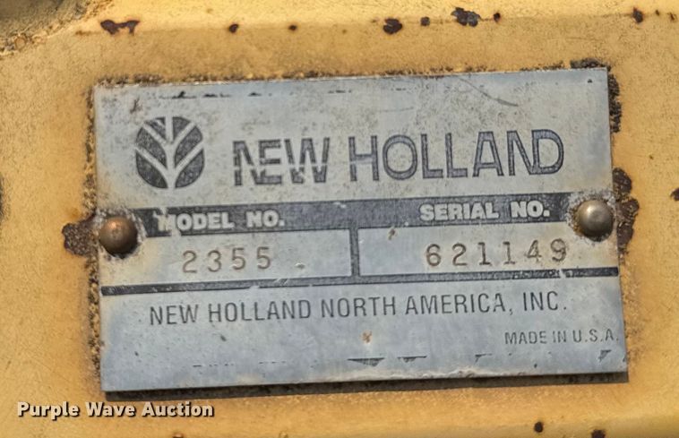 image for item ER2118 1999 New Holland HW340 swather / windrower