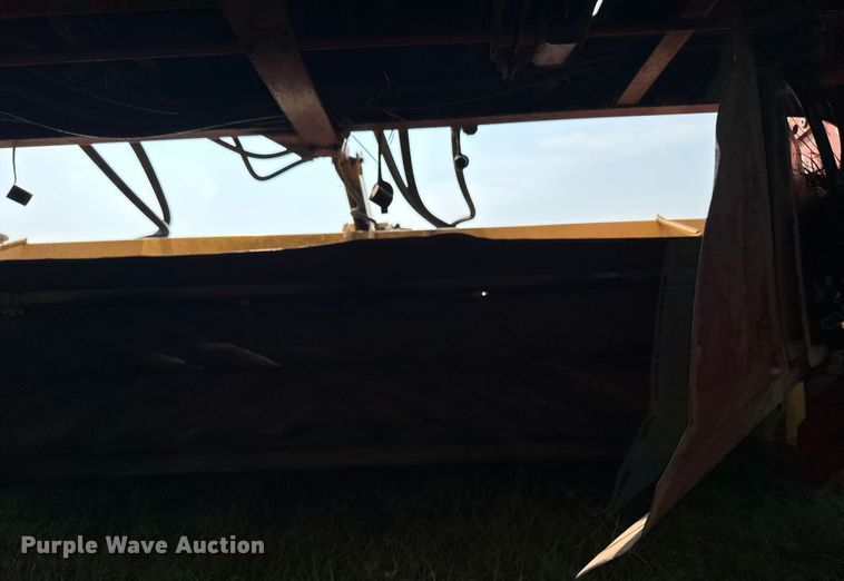 image for item ER2118 1999 New Holland HW340 swather / windrower