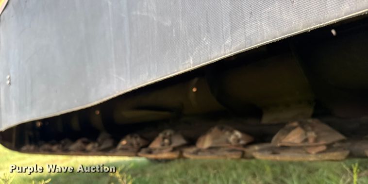 image for item ER2118 1999 New Holland HW340 swather / windrower