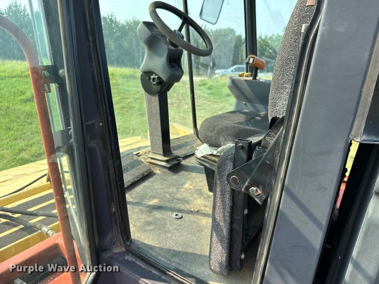 image for item ER2118 1999 New Holland HW340 swather / windrower