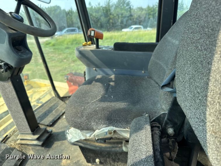 image for item ER2118 1999 New Holland HW340 swather / windrower