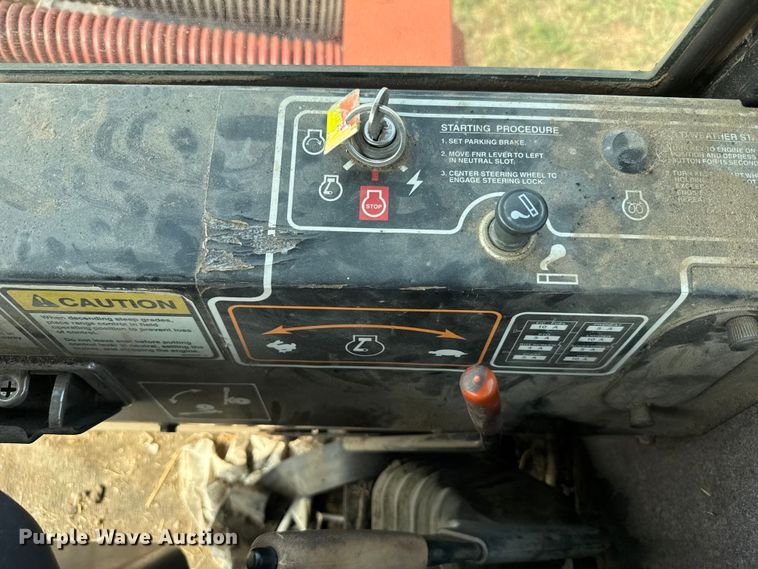 image for item ER2118 1999 New Holland HW340 swather / windrower