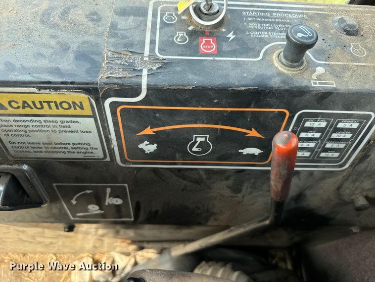 image for item ER2118 1999 New Holland HW340 swather / windrower