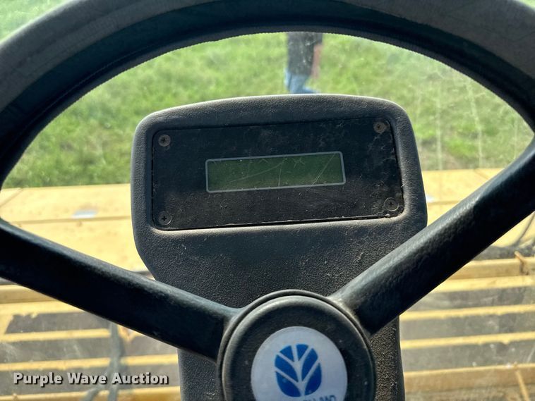 image for item ER2118 1999 New Holland HW340 swather / windrower