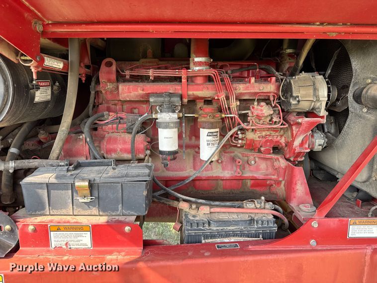 image for item ER2118 1999 New Holland HW340 swather / windrower