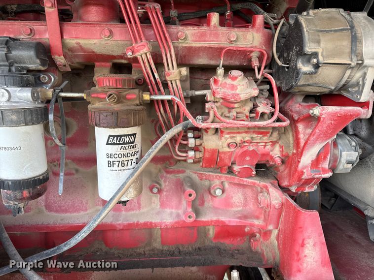 image for item ER2118 1999 New Holland HW340 swather / windrower