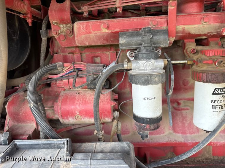 image for item ER2118 1999 New Holland HW340 swather / windrower