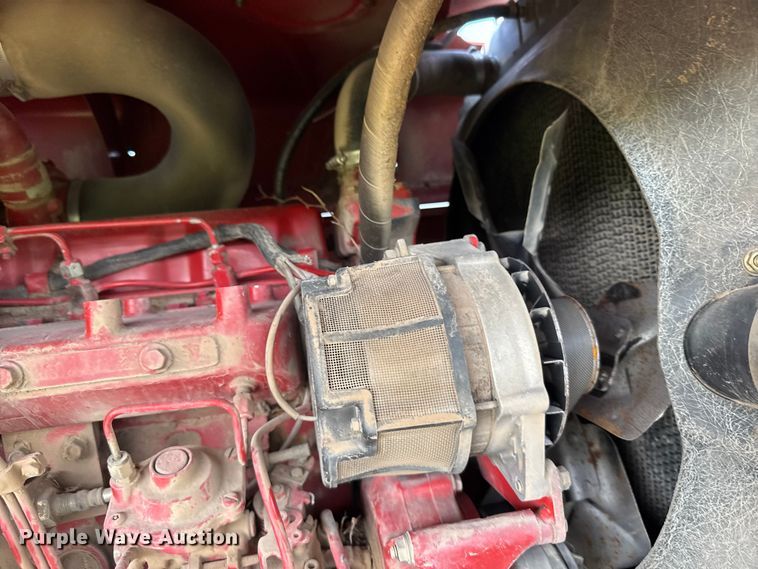 image for item ER2118 1999 New Holland HW340 swather / windrower