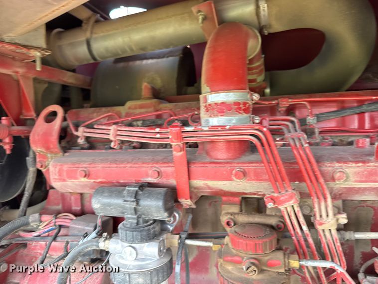 image for item ER2118 1999 New Holland HW340 swather / windrower