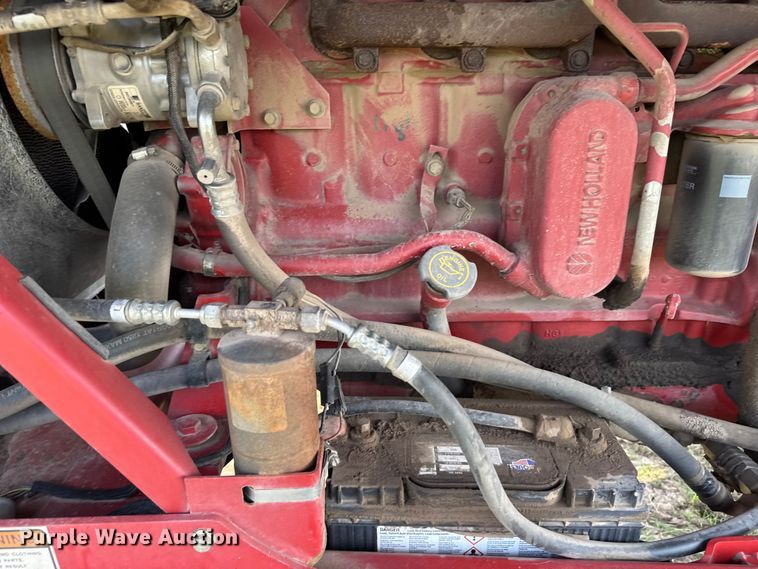 image for item ER2118 1999 New Holland HW340 swather / windrower