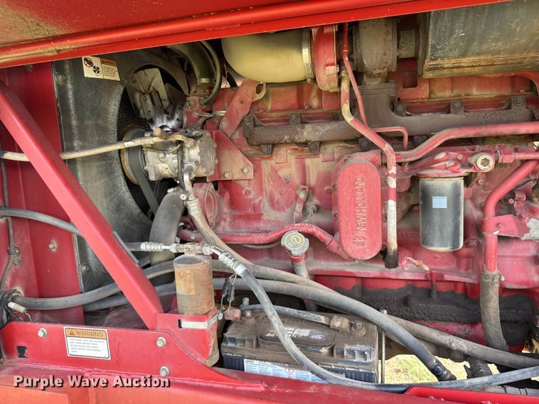 image for item ER2118 1999 New Holland HW340 swather / windrower