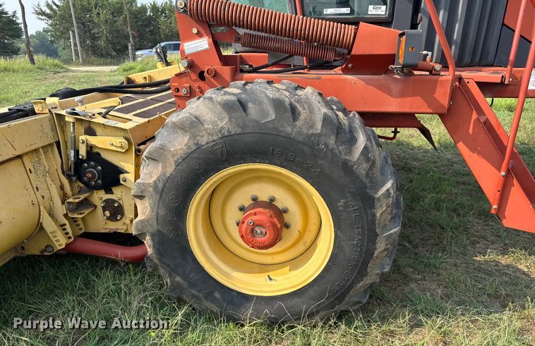 image for item ER2118 1999 New Holland HW340 swather / windrower
