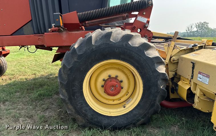 image for item ER2118 1999 New Holland HW340 swather / windrower