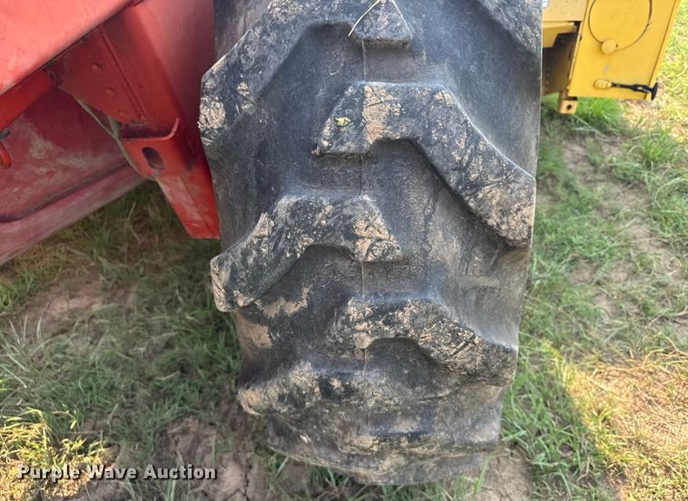 image for item ER2118 1999 New Holland HW340 swather / windrower