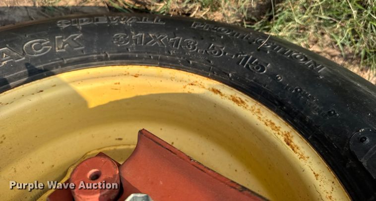 image for item ER2118 1999 New Holland HW340 swather / windrower