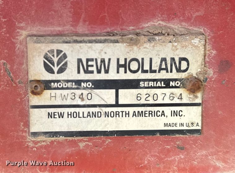 image for item ER2118 1999 New Holland HW340 swather / windrower