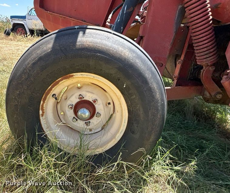 image for item EU0003 2004 New Holland 1431 swather swather / windrower