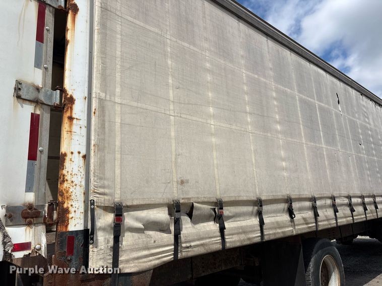 image for item EC4353 2004 GMC C8500 side curtain box truck