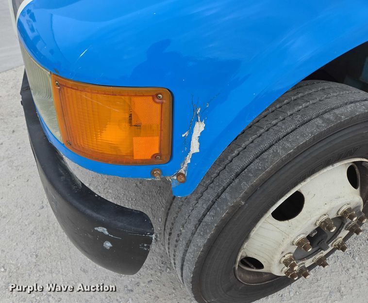 image for item ED2177 2000 International 4700 flatbed truck