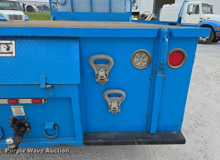 image for item ED2177 2000 International 4700 flatbed truck