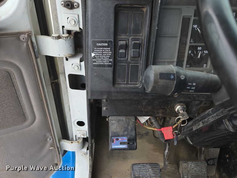 image for item ED2177 2000 International 4700 flatbed truck