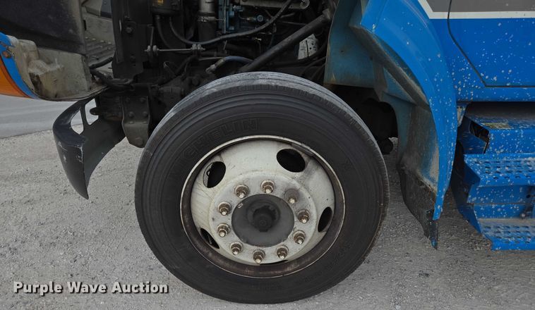 image for item ED2177 2000 International 4700 flatbed truck