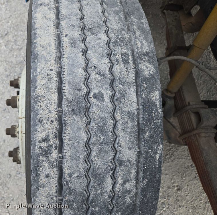 image for item ED2177 2000 International 4700 flatbed truck