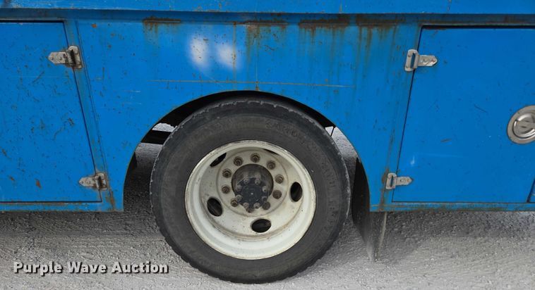 image for item ED2177 2000 International 4700 flatbed truck