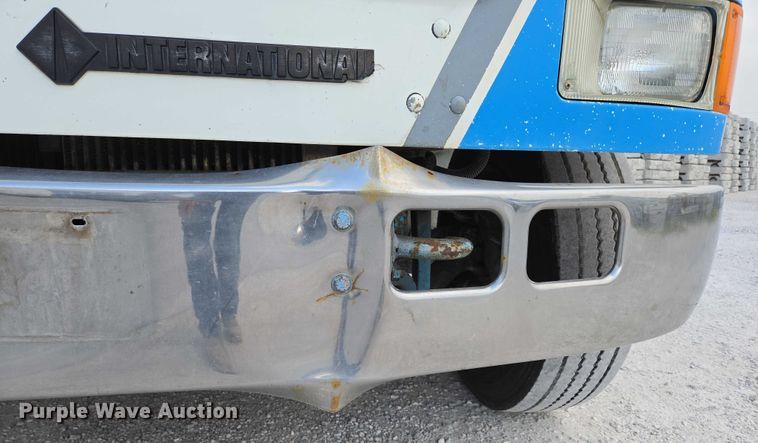 image for item ED2178 2000 International 4700 flatbed truck