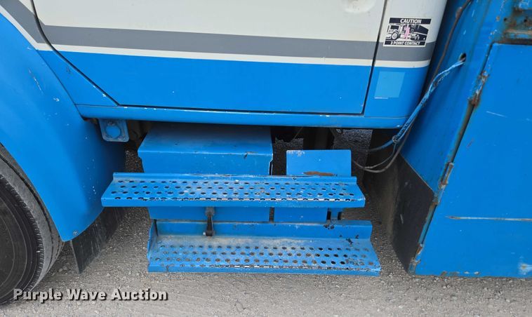 image for item ED2178 2000 International 4700 flatbed truck