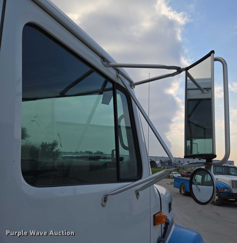 image for item ED2178 2000 International 4700 flatbed truck