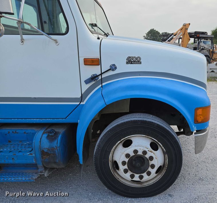 image for item ED2178 2000 International 4700 flatbed truck