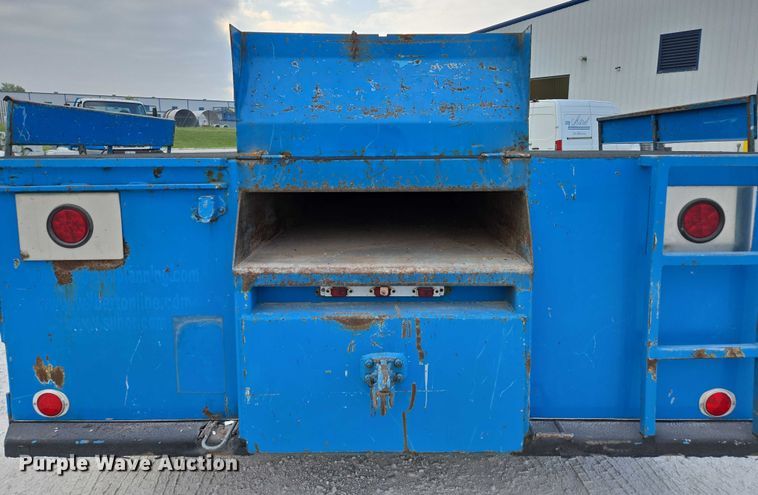 image for item ED2178 2000 International 4700 flatbed truck