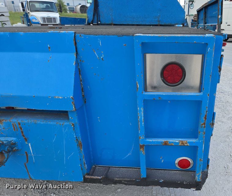 image for item ED2178 2000 International 4700 flatbed truck