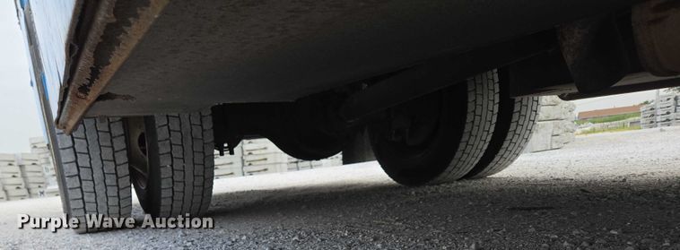 image for item ED2178 2000 International 4700 flatbed truck