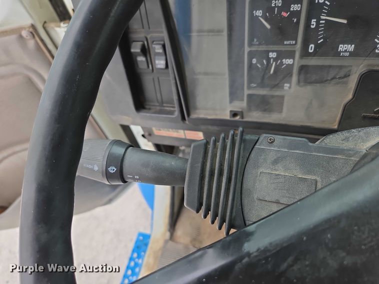 image for item ED2178 2000 International 4700 flatbed truck