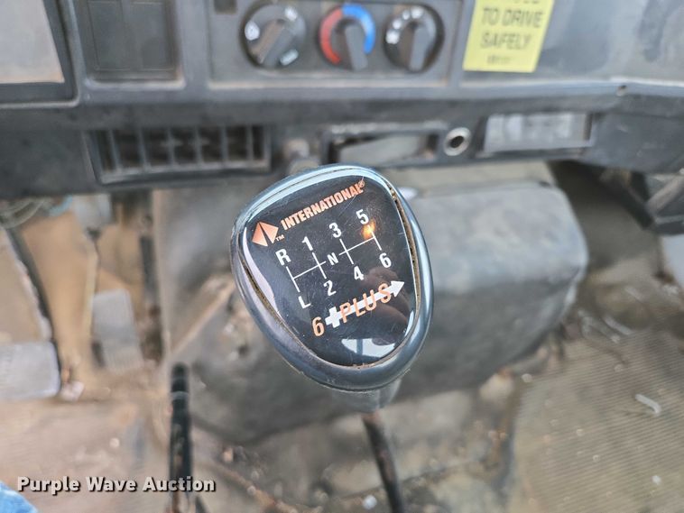 image for item ED2178 2000 International 4700 flatbed truck